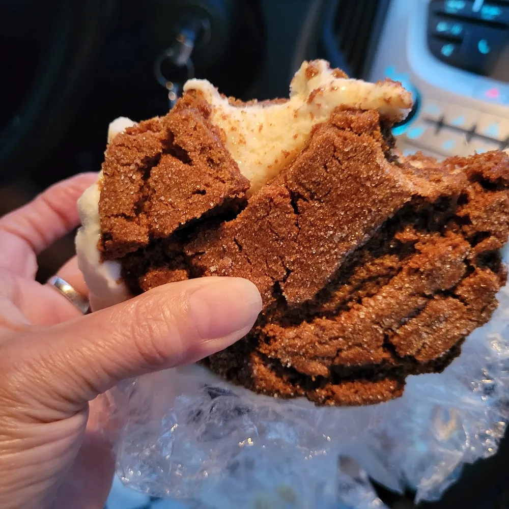 Homemade Molasses and Ginger Ice Cream Between Homemade Ginger Cookie